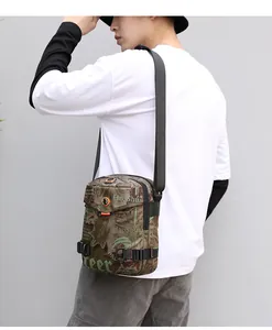 Men's camouflage crossbody bag shown on model highlighting the sporty outdoor design