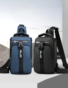 Detail showing dual navy and black tactical sling bags with external USB charging ports
