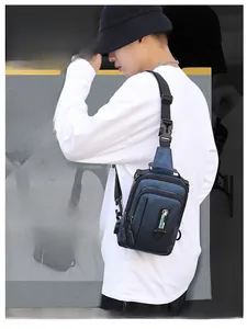 Deep blue waterproof nylon chest bag for men shown on model for outdoor travel use
