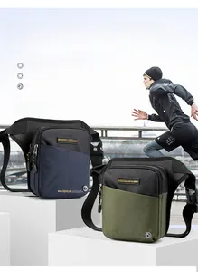 Detail of waterproof tactical leg bag showing multi-pocket design and crossbody strap