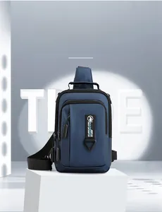 Detail showing dark blue waterproof chest bag with vertical zipper and adjustable strap