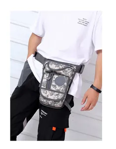 Détail du sac de jambe tactique camouflage numérique montrant le nylon durable et la boucle