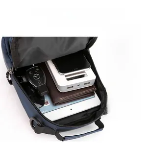 Interior view showing the large capacity and organized compartments of the blue chest bag
