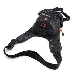 Waterproof tactical drop leg bag with orange accents and adjustable straps for cycling