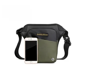 Detailed size comparison of the tactical leg bag next to a smartphone device