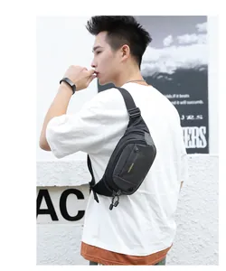 Waterproof nylon sports waist bag with adjustable strap worn as a crossbody chest pack
