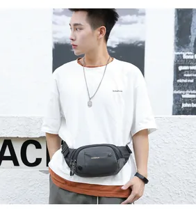 Close-up of waterproof grey nylon waist bag featuring headphone port and zipper details