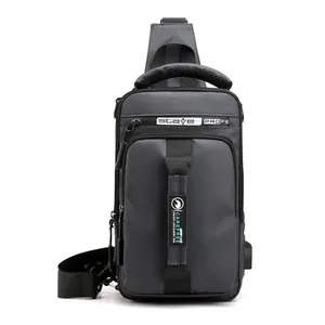 Waterproof dark grey men's chest bag with USB charging port and multi-functional straps