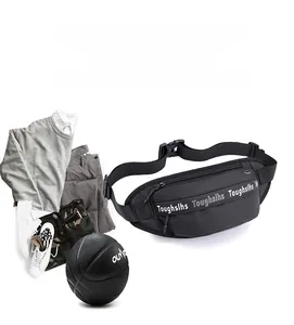 Detail of waterproof black fanny pack with adjustable strap and durable buckle closure