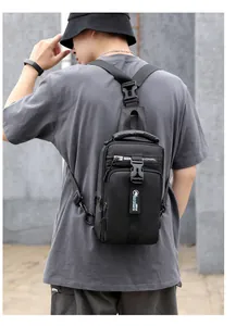 Close-up of black waterproof nylon chest bag featuring adjustable strap and buckle detail