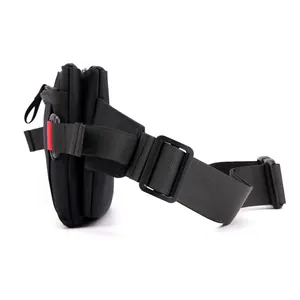 Slim black oxford fabric outdoor waist bag with red straps and dual zipper compartments