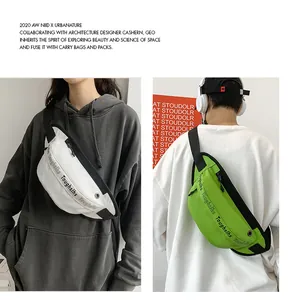 Detail of waterproof nylon waist bag showing white and green texture with black straps