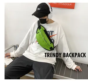 Street style bright green waterproof waist bag worn crossbody by a model in a casual setting