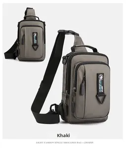 Detail view of khaki waterproof crossbody chest bag showing USB port and buckle