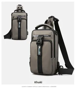 Detail view of khaki crossbody sling bag featuring USB port and adjustable shoulder strap