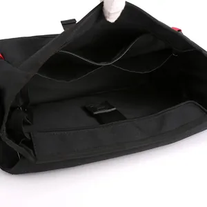 Internal view of waterproof oxford messenger bag featuring multi-compartment storage pockets