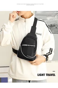 Close-up of black water-resistant crossbody chest bag for men with adjustable strap