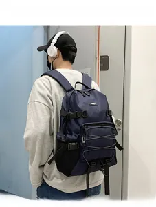 Detail of navy blue waterproof nylon backpack with side buckle and elastic cords