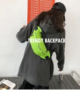 Neon green waterproof waist bag featuring black zippers and Toughslhs lettering print