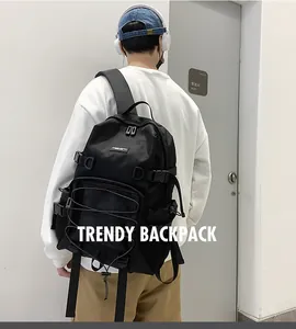 Detailed view of black large capacity backpack with adjustable elastic drawstrings