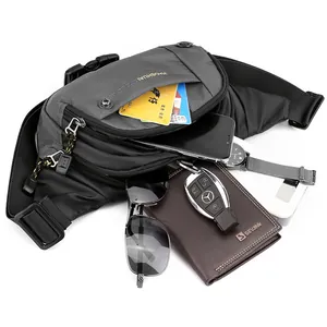 Waterproof grey nylon sports waist bag with multiple zipper pockets for outdoor hiking
