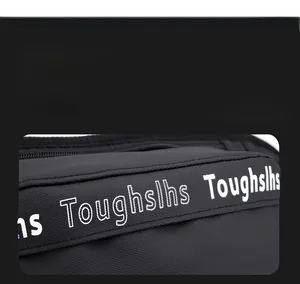 Detail showing durable black nylon fabric with Toughslhs printed logo on sport waist bag