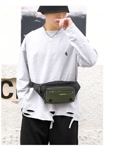 Detail of adjustable strap and multi-zipper compartments on a nylon outdoor waist bag