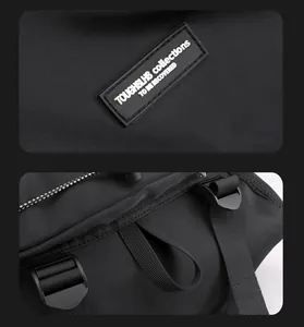 Detail of durable black nylon backpack with rubber logo patch and tactical hanging loop