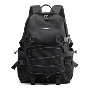 Black outdoor tactical backpack with multi-pocket system and buckle straps on white background