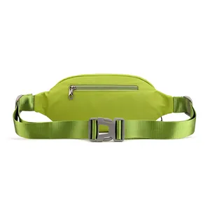 Rear view of bright green waterproof waist bag with adjustable strap and metal zipper