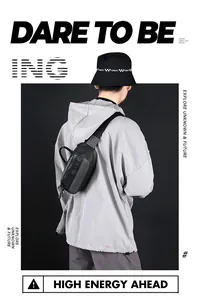 Detail of waterproof black chest bag with WE POWER text and adjustable strap