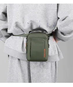 Outdoor dark green canvas waist bag with WEPOWER logo worn on belt by a male model