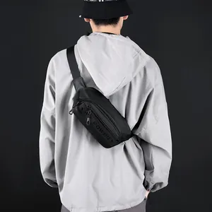 Waterproof black crossbody chest bag for men with THE POWER embossed logo and adjustable strap