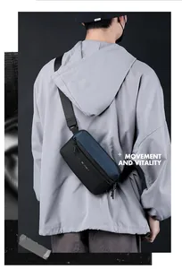 Detail of waterproof zipper and WE POWER logo on technical crossbody chest bag