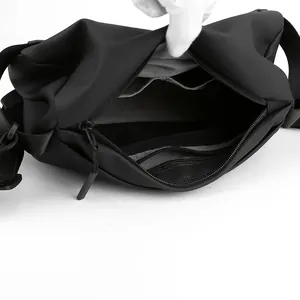 Waterproof nylon crossbody bag for men featuring organized internal compartments