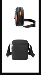 Detail view of water-resistant nylon cross-body bag with orange zippers and layered compartments
