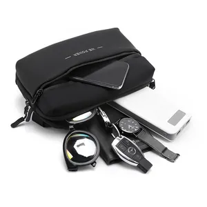 Waterproof black crossbody bag with multiple zip compartments and WE POWER logo display