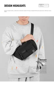 Détail d'un sac bandoulière noir en nylon multi-poches avec large sangle sur mannequin