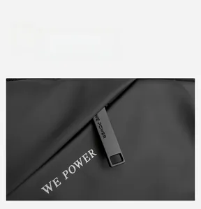 Detail shot of the durable waterproof zipper and brand logo on this functional bag