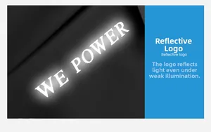 Detail view of the reflective WE POWER logo on black water-resistant fabric for visibility