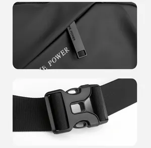 Detail of smooth black zipper and durable plastic buckle on waterproof outdoor bag
