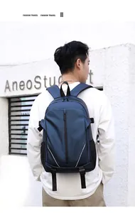 Detail of water-resistant navy blue backpack with reflective safety strips for travel