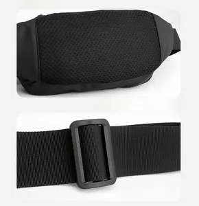 Detail of breathable honeycomb mesh back and adjustable nylon shoulder strap on black bag