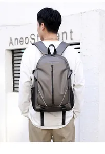 Waterproof travel backpack showing back ergonomic straps and side mesh bottle pocket