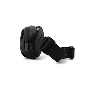 Waterproof black tactical waist bag with multi-layer zippers and adjustable wide strap