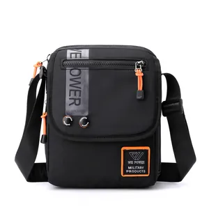 Men's black tactical crossbody bag with bright orange zippers and military-style details
