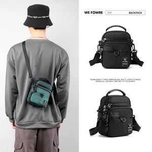 Waterproof sports crossbody bag in black and green with multi-layer storage compartments