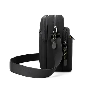 Mini black nylon crossbody bag for men with functional multi-zipper compartments