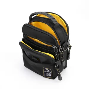 Waterproof crossbody sports bag with black and yellow contrast and multi-zipper pockets