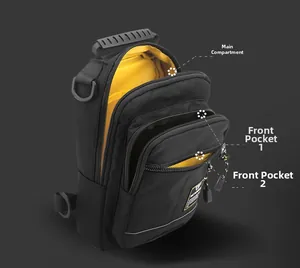 Detail view of the black crossbody bag showing three zippered compartments and yellow lining